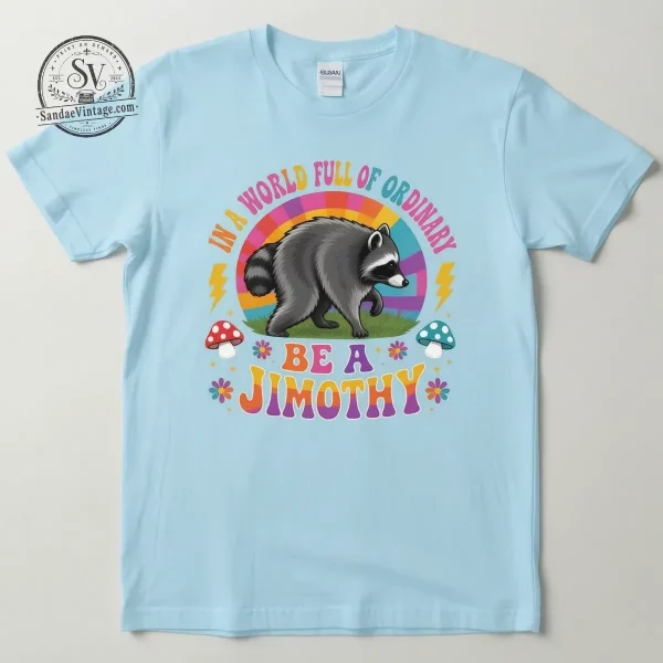 In A World Full Of Ordinary Be A Jimothy Retro Raccoon Meme T-Shirt 1 Close up detail of the raccoon graphic showing vibrant neon inks and retro font styling.